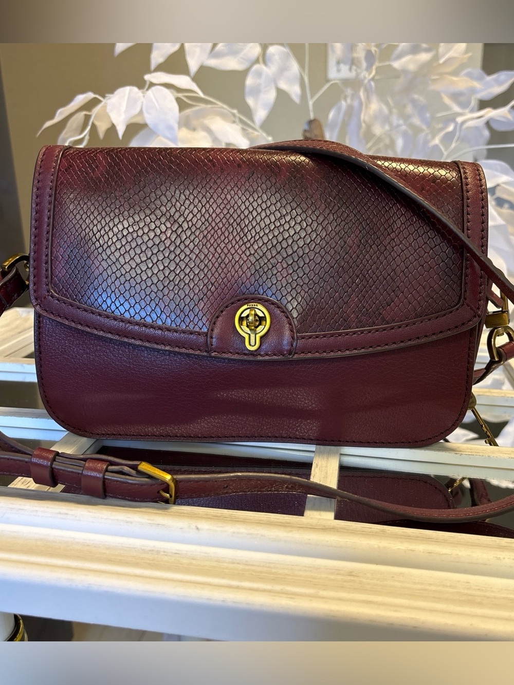 Fossil Wine Maroon Leather Crossbody Bag with Snakeskin embossed leather Flap.
